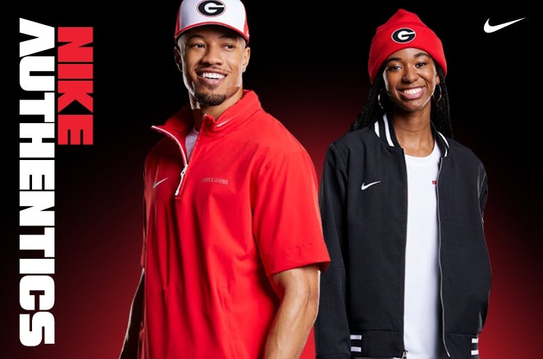 A coach and an athlete wearing Nike Authentics apparel