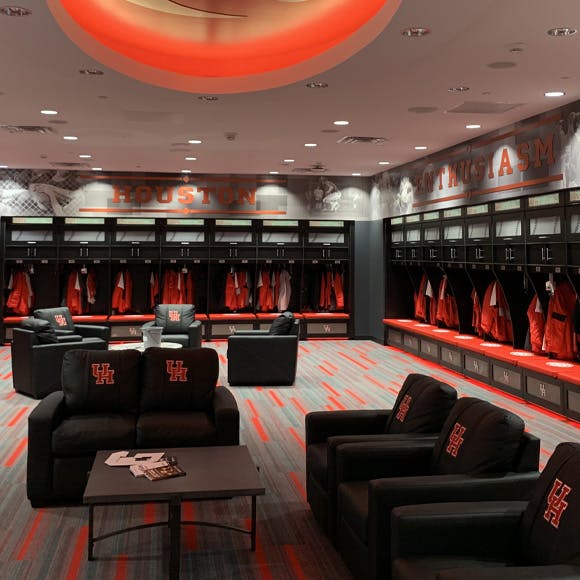 Locker room with customized signage and furniture